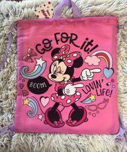 Load image into Gallery viewer, Minnie Mouse pink drawstring bag with purple handle says "go for it, loving life, boom"