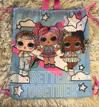 Load image into Gallery viewer, blue drawstring bag, 3 female cartoon characters on the front, pink handle, says "better together"