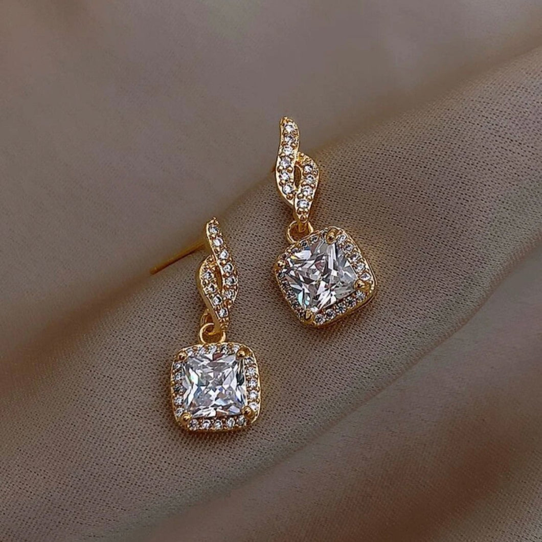 square shaped gold and crystal earrings