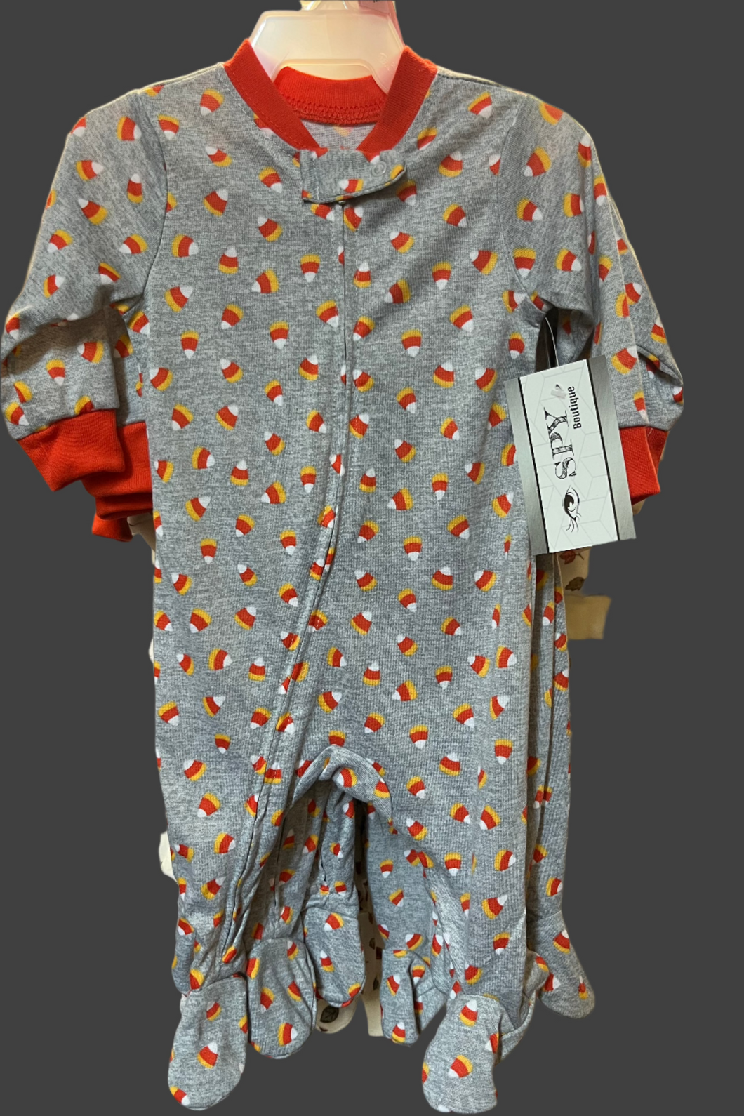 Candy corn onesie, gray background, orange collar and sleeve ends